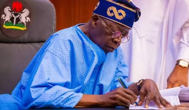 Tinubu-signs.jpeg